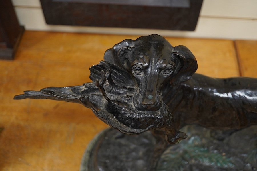 After Jules Moigniez (1835-1894), a cast bronze of a pointer with a pheasant, 60cm wide. Condition - good